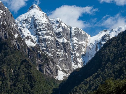 Snowcovered mountain range along river Rio Norte in the valley Valle Exploradores, road from Puerto