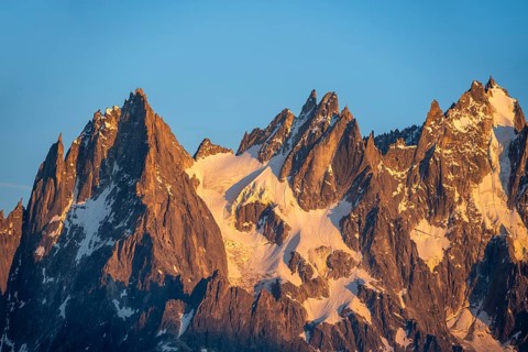 Rocky peaks at sunset, alpenglow, Aiguille du Midi and Aiguille du Plan, Mont Blanc massif,