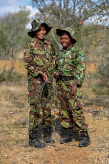 Two women from the anti-poacher unit Black Mambas with confiscated poacher snares, Balule Game