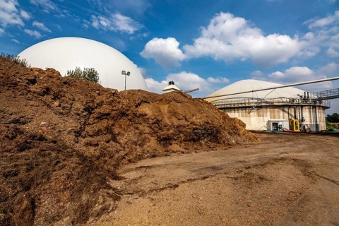 Biogas plant, gas storage, with dome, use of solid manure as energy source, storage area, on a farm
