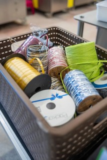 Versatile ribbons in various colors in a box for creative packaging
