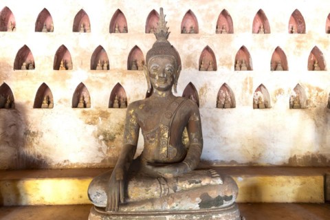 Ancient Buddha statues in the courtyard of Wat Si Saket, Vientiane, Vientiane province, Laos