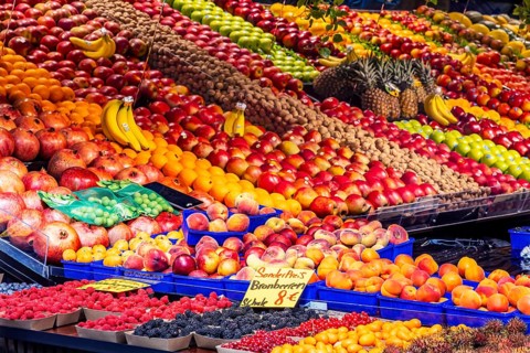 Fruit stall with exotic fruit. Market at Carlsplatz, Düsseldorf, North Rhine-Westphalia, Germany