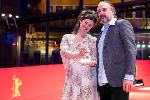 Anna Fitch (US director) and Banker White (US director) pose with the Silver Bear for Outstanding