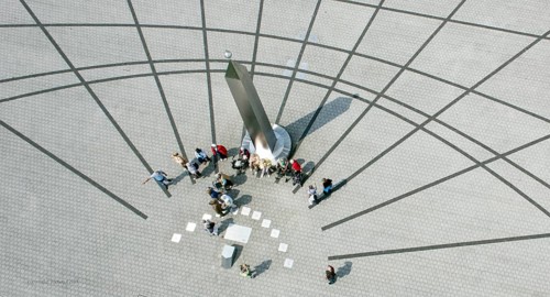 Herten, DEU, 05.06.13 JE - Visitors look at an obelisk on a large sundial in the Hoheward Landscape