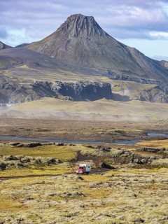 Skafta river and Uxatindar mountain range, camper van on road F206, Laki tourist road, Iceland