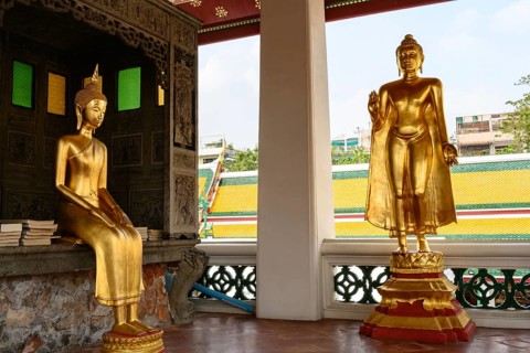 Bangkok, Thailand. February 20th 2025. Golden Buddhist statues in a pavilion at the The Wat Suthat