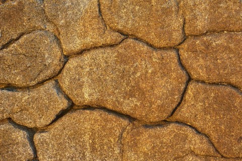 Stone with cracks, weathered rock by the sea, Quiberon, Brittany