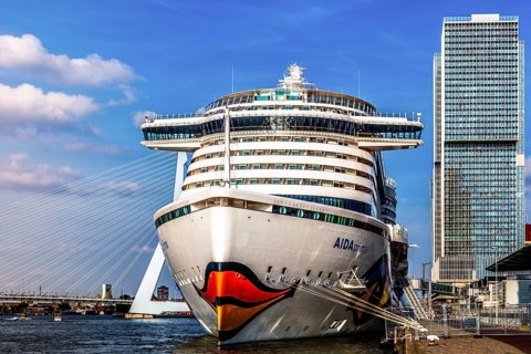 Cruise dock at the World Port Center, a distinctive skyscraper on Wilhelminapier in the harbor, by