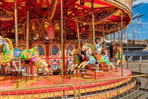 Children's carousel at Greenwich harbour, Royal Borough of Greenwich, London, England, Great