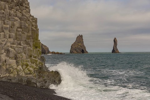 Reynisfjara Beach with Basalt rocks and the rock needles, close to Vik i Myrdal, South Iceland