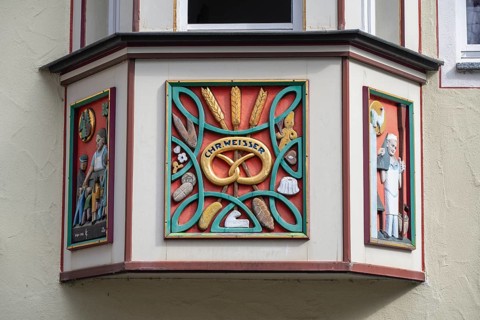 Detailed view of a town house, in the historic old town of Rottweil with an artfully decorated bay