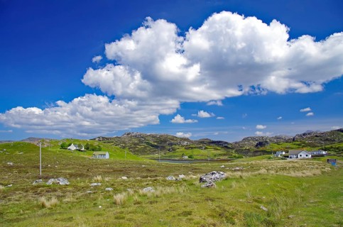 Wide hilly landscape under big white clouds in the blue sky, Durness, Highlands, Scotland, Great