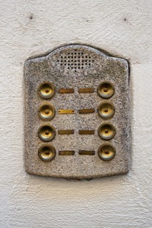 Old, rustic intercom system, doorbell on a house wall, Lindau, Bavaria, Germany