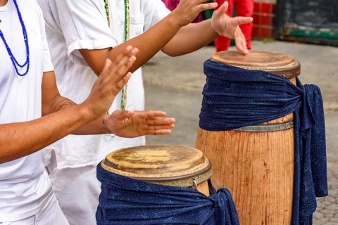 Atabaque, a traditional African drums being played on the streets of Brazil during Umbanda