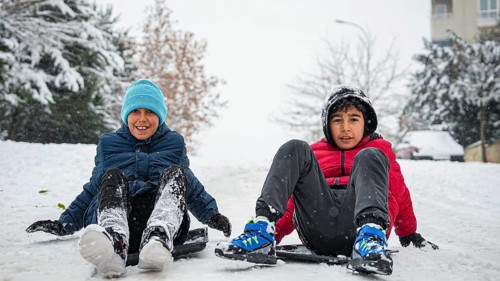 In Gaziantep, Turkey, on December 31, 2025, children and families enjoy winter activities as they