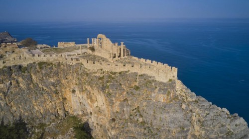 Drone shot, Acropolis of Lindos, Late afternoon light, Remains of an ancient fortress on a high