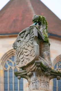 Fountain column with lion and coat of arms with double-headed eagle, 16th century, Dinkelsbühl,