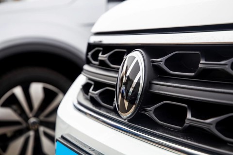 Close-up of vehicles from the car manufacturer VW in a car dealership