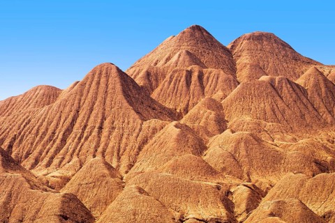 Eroded sedimentary formations create mesmerizing patterns in the Devil's Desert (Desierto del