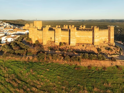 The impressive Moorish Burgalimar castle at the town of Baños de la Encina is surrounded by