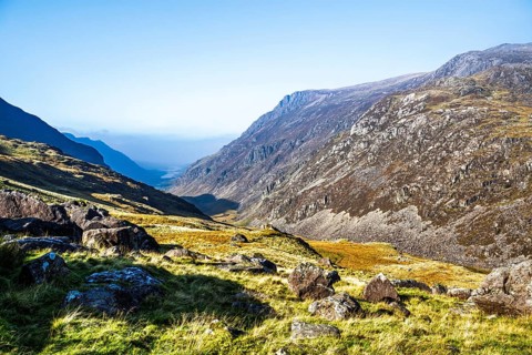 Autumn colours of Pen-y-Pass over Miner's Track, Start Point and road A4086, Snowdonia, Wales, UK