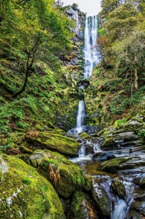 Autumn colors over Pistyll Rhaeadr Waterfall, Berwyn Mountains, Oswestry, Shrewsbury, Wales, UK