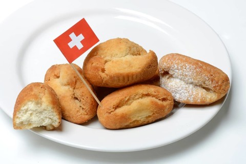 Schenkeli on a plate, sweet pastry for carnival time, Switzerland