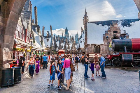 Families on street of Hogsmead in The Wizarding World of Harry Potter at Universal Studios Islands