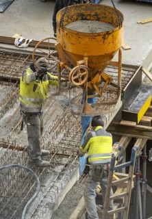 Construction site, concreting, the ceiling of a building is concreted, the concrete is placed on