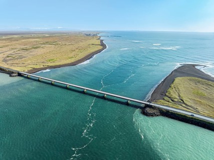 Bridge over Ölfusa river, open sea, near Eyrarbakki, aerial view, southern coast, Iceland
