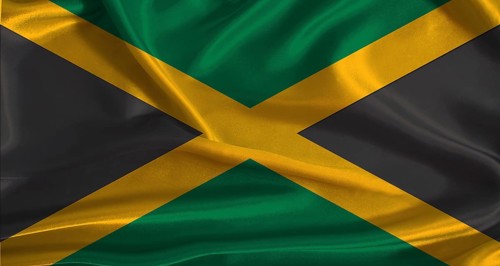 Jamaica flag with cloth textured background. National flag of Jamaica with realistic texture
