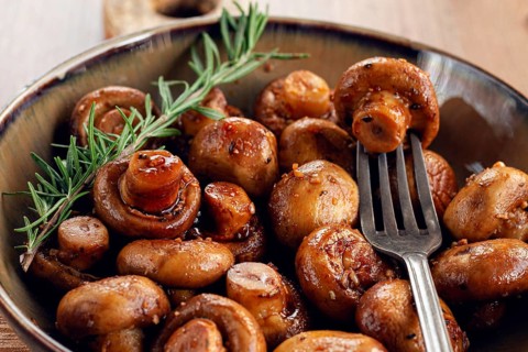 Fried mushrooms, with spices, in soy sauce, vegetarian food, homemade, no people