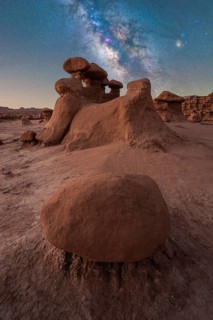 Breathtaking view of the Milky Way over unique sandstone structures in Goblin Valley State Park,