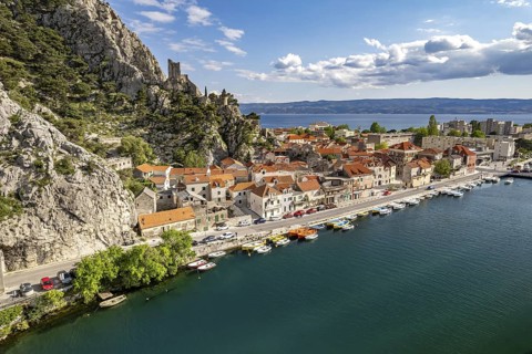 The old town centre of Omis with the ruins of the Mirabella or Peovica fortress seen from above,