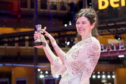 Anna Fitch (US director) poses with the Silver Bear for Outstanding Artistic Achievement for the