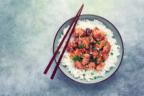 Fried chicken teriyaki with rice, green onion and sesame, homemade, no people