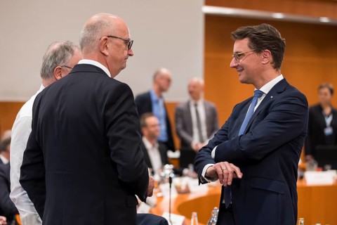 Dietmar Woidke (Member of the Brandenburg State Parliament, SPD) and Hendrik Wüst (Minister