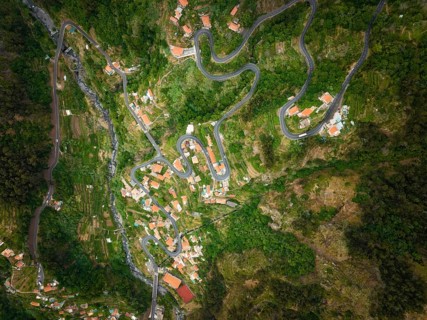 Aerial drone top down view of Curral das Freiras village in Valley of the Nuns from Miradouro da