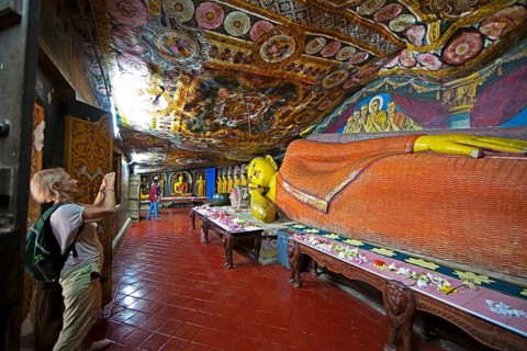 Reclining Buddha in Aluvihara Rock Cave Temple or Cave Monastery, Aluvihara, Matale, Central