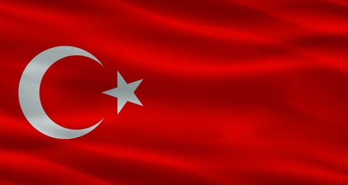 Turkish flag with a fabric texture waving. Close up of flag of Turkey with cloth texture