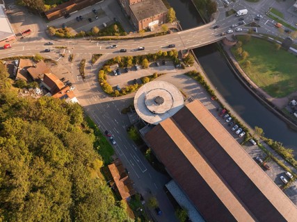 Aerial view of streets and buildings with a river and a roundabout, Calw, Black Forest, Germany