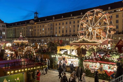 Striezelmarkt Christmas market and Ferris wheel on the Altmarkt in Dresden, Saxony, Germany