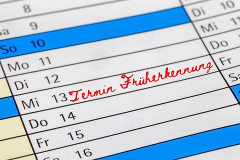 Symbolic image of early detection: Calendar with a note of an appointment for an early detection
