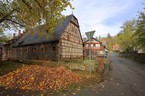 Timbered house with piles of leaves, autumn, castle, Ramholz, Vollmerz, Schlüchtern, Vogelsberg,