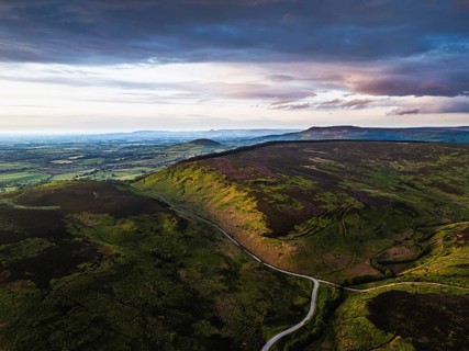 Sunset over Cod Beck Reservoir from a drone, North York Moors National Park, North Yorkshire,
