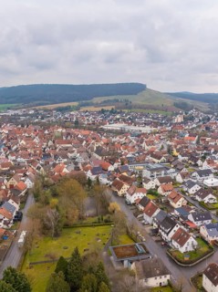 Aerial view of a town with densely packed houses and surrounding hills, Großbottwar, Ludwigsburg