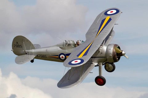 Gloster Gladiator biplane aircraft in RAF Royal air force colours flying, England, United Kingdom