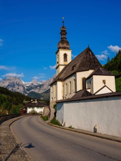 Parish church of St Sebastian, Reiteralpe at the back, Ramsau, Berchtesgadener Land, Upper Bavaria,