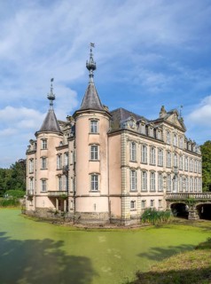 1750 moated Poeke Castle, Kasteel van Poeke in Rococo style near Aalter, East Flanders, Belgium